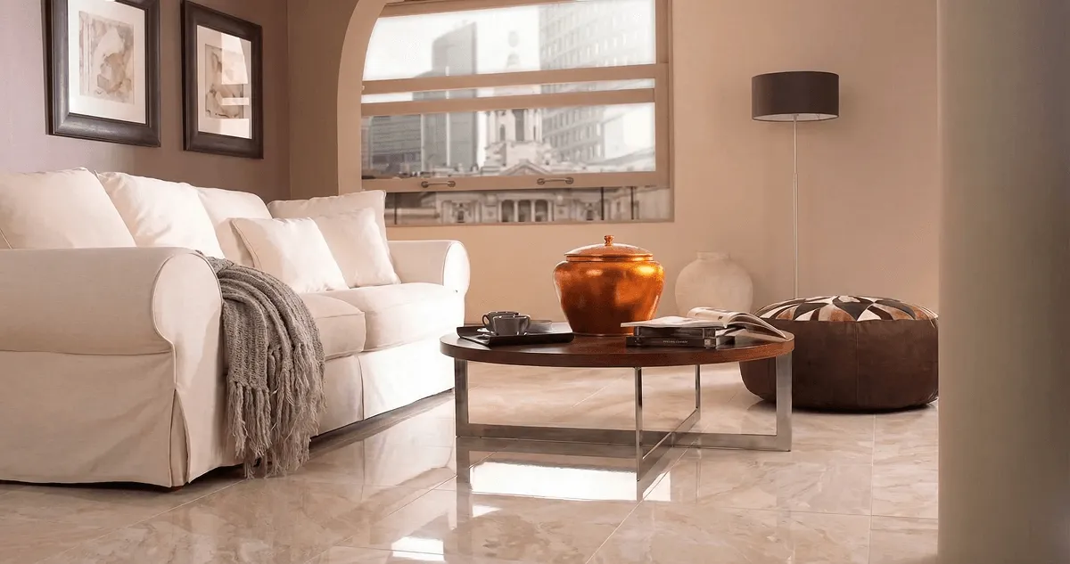 Modern living room with professionally installed marble flooring, a beige sofa, coffee table in Pasadena, CA