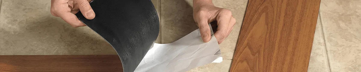 A professional installing vinyl flooring in Pasadena, CA